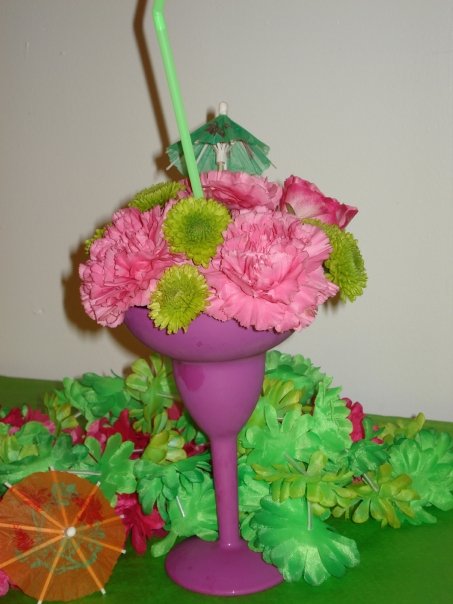 Using Pink Carnations A Pink Rose And Green Fuji Mums Inside A Purple Plastic Margarita Cup Designed By Every Blooming Thing In Akron Ohio Using Pink Carnations A Pink Rose And Green Fuji Mums Inside A Purple Plastic Margarita Cup Designed By Every Blooming Thing In Akron Ohio