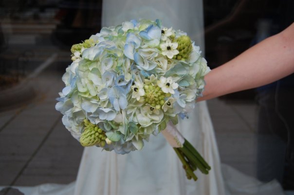 This photo shows a lovely hydrangea wedding bouquet designed by Monday