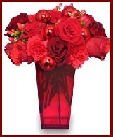 Holiday Bouquet Using Powerful Red Flowers