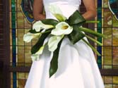 Bride holding a calla lily wedding bouquet