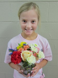 Young Girl Holding Flowers