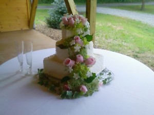Wedding cake flowers by Swannanoa Flower Shop, Swannanoa NC