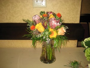 Beautiful protea and rose arrangement