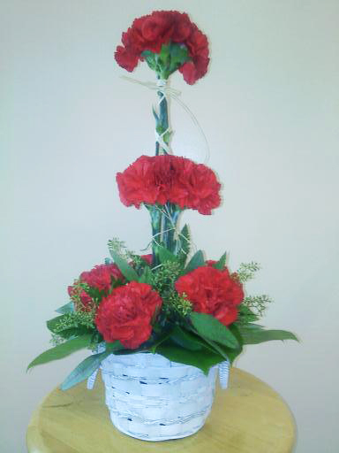 Carnation flower arrangement by Dietrich Flower Shop, Durand MI