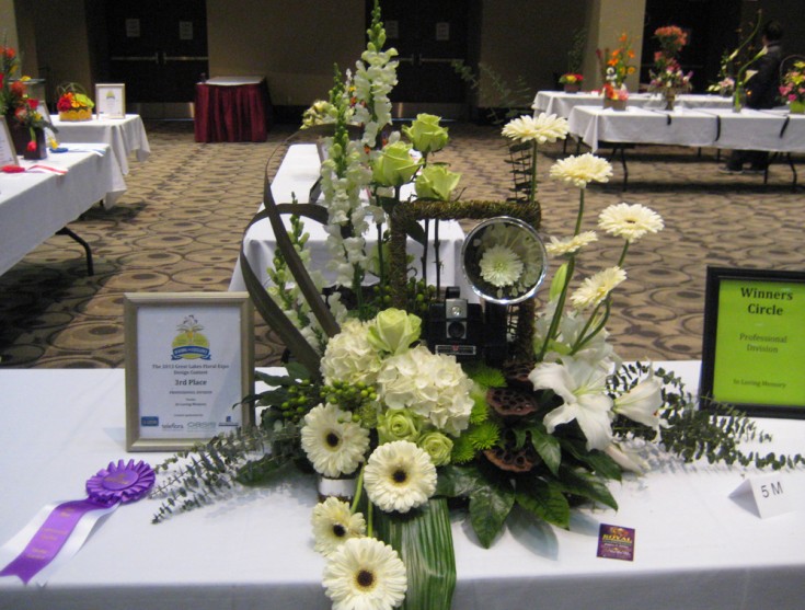 Unusual photographer themed design at the 2013 Great Lakes Floral Expo