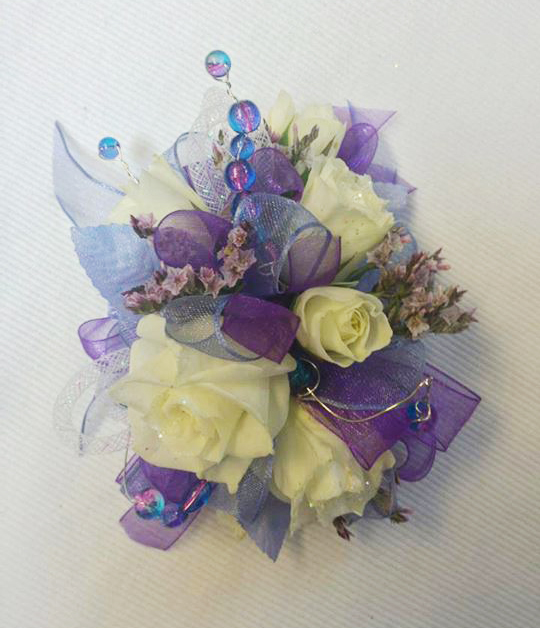Purple & white corsage by Jocelyn's Floral, Cedar City UT
