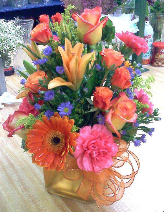 Orange flowers by Carthage Flower Shop, Carthage TX