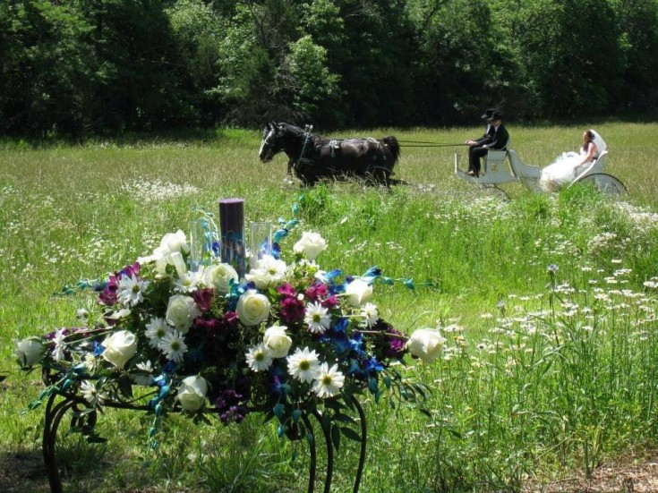 Beautiful wedding arrangement by the Flower Patch & More in Bolivar, MO