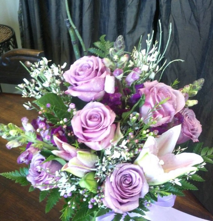 Beautiful lavendar roses with Floral Design in Post Falls, ID
