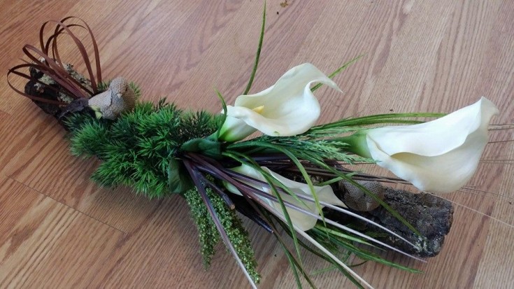 Cala Lilies and moss displayed on cork from BlueShores Flowers & Gifts in Wasaga Beach, ON
