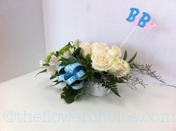 A baby themed arrangement from The Flower Choice of Hollywood, FL