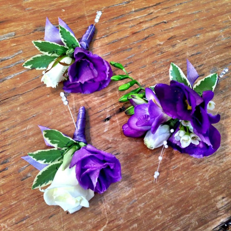 Boutonnieres and a corsage from Petals in Thyme of Wasaga Beach, ON