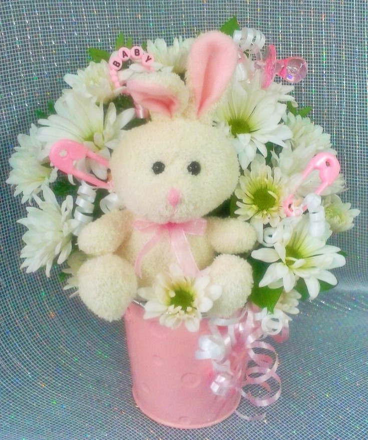 Hugs and kisses to a sweet baby girl from Marshfield Blooms in Marshfield, MO