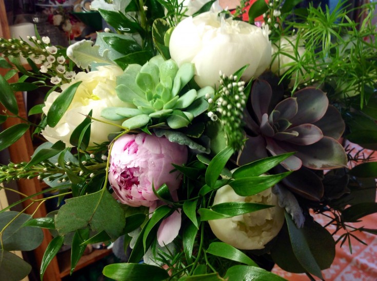 Succulents and peonies in a lush bridal bouquet from Frey Florist & Greenhouse in Providence, RI