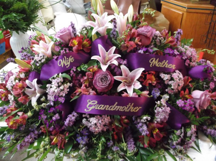 Casket spray for a special customer at Marshfield Blooms in Marshfield, MO
