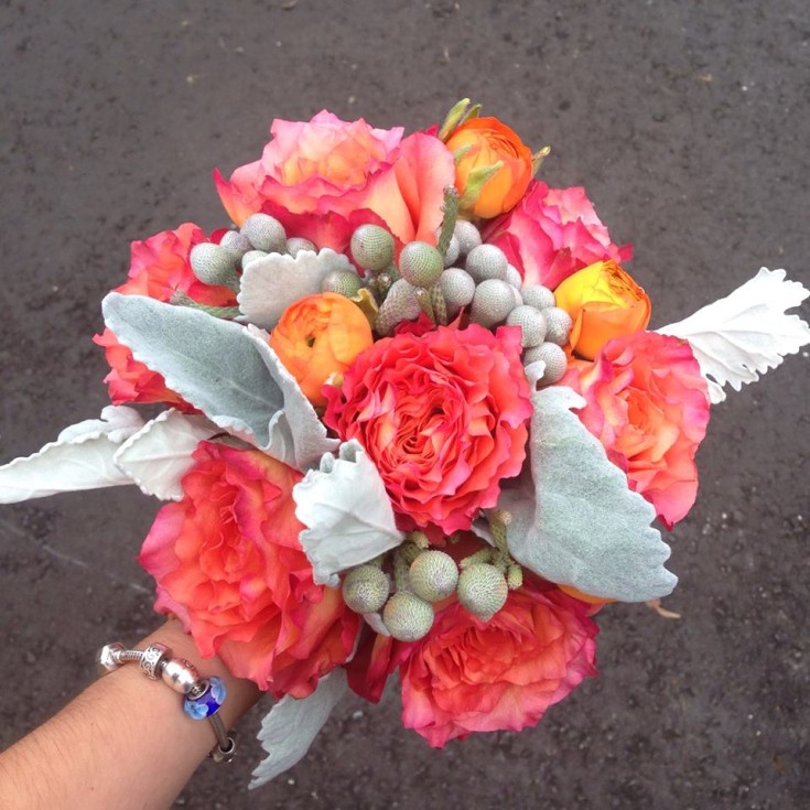 A wedding bouquet in coral and greys with Petals in Thyme of Wasaga Beach, ON