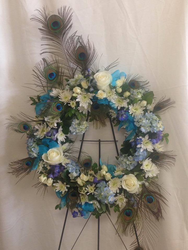 Excellent sympathy wreath from Enchanted Florist of Pasadena in Pasadena, TX