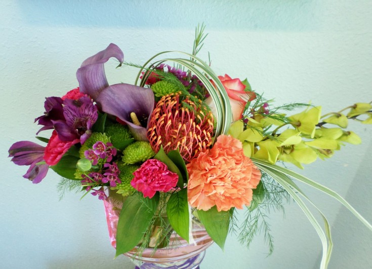 A bright and cheery arrangement from Klamath Flower Shop in Klamath Falls, OR