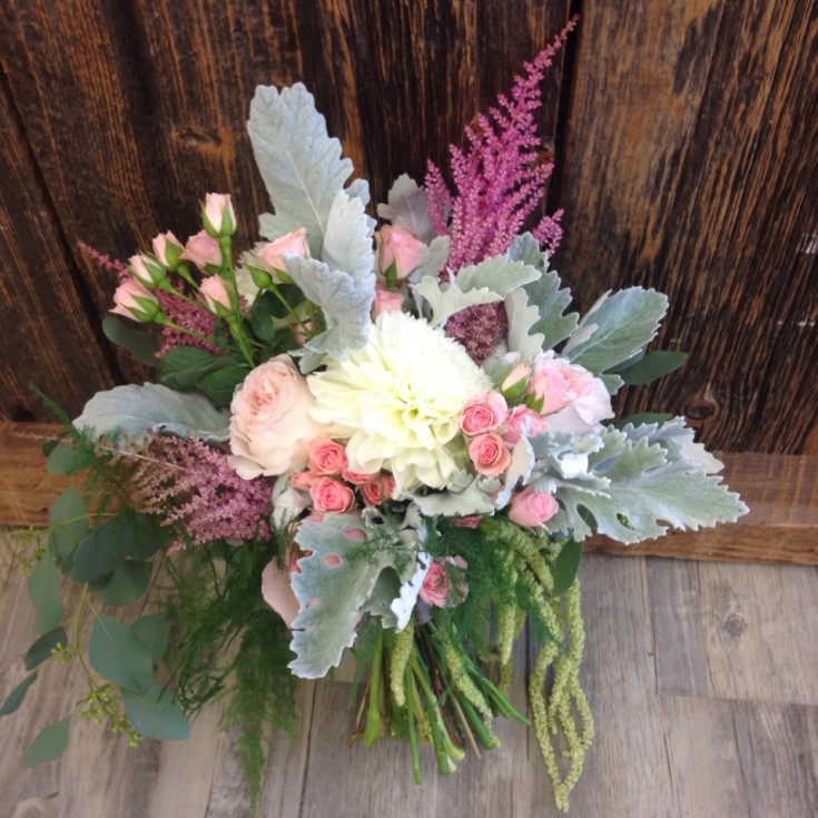 A gorgeous bridal bouquet from Petals in Thyme in Wasaga Beach, ON
