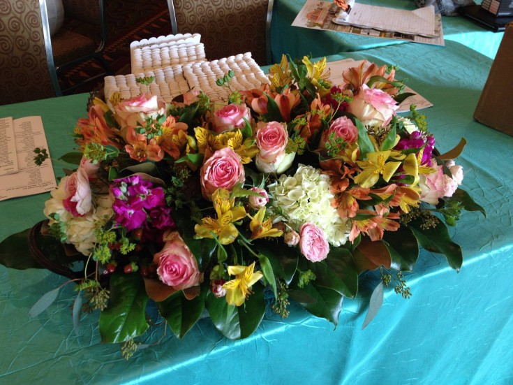 Gorgeous registration table piece from The Flower Patch & More in Bolivar, MO