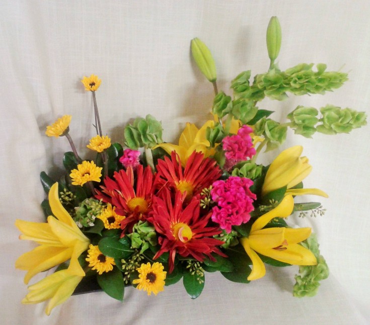 A fresh arrangement for the local restaurant's checkout counter at Marshfield Blooms in Marshfield, MO