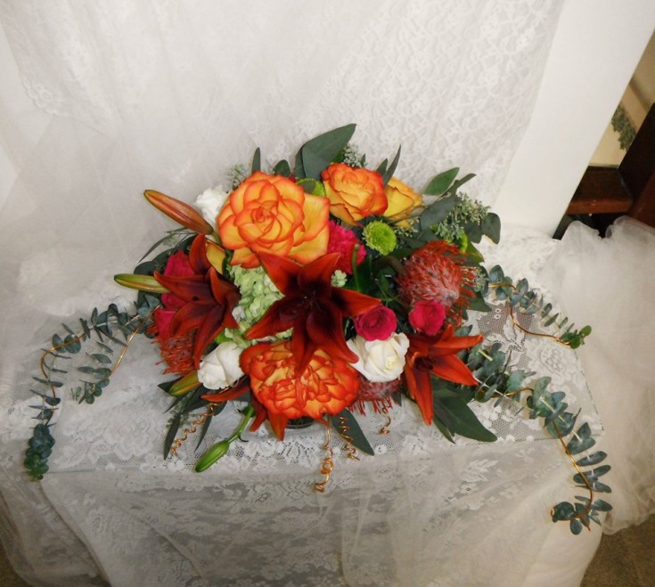 Brilliant bridal crescent cascade from Crow River Floral and Gifts in Hutchinson, MN