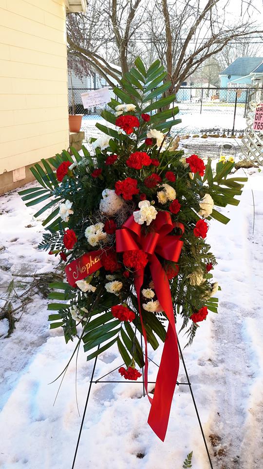 Exquisite standing arrangement by Garden Gate Flower Shop in North Salem